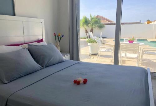 Postel nebo postele na pokoji v ubytování Genesis Apartments