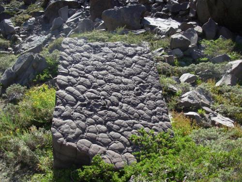 a rock formation on a field of rocks at Hostal Crisol in Lo Valdés