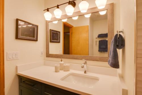 a bathroom with a sink and a large mirror at 8 Mi to Copper Mountain Frisco Vacation Rental in Frisco