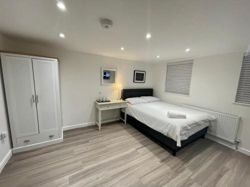 Voodi või voodid majutusasutuse Riverside Studio Apartment Docklands E14 toas