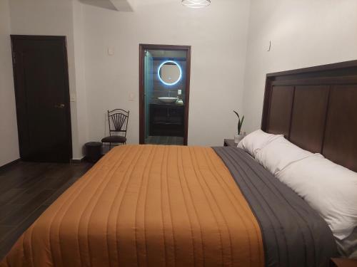 Hotel Cantera Jaguarにあるベッド