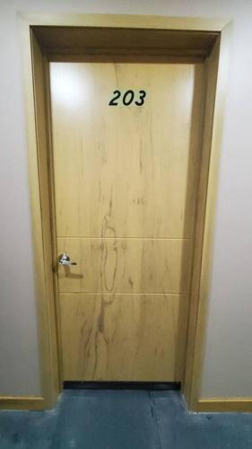 a door with the number written on it at Lugar perfecto para descansar.²⁰³ in Fortín de las Flores