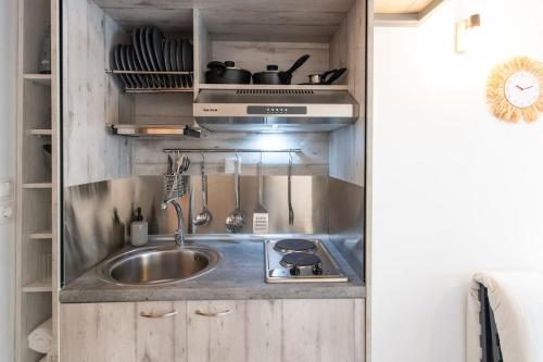 Kuchyň nebo kuchyňský kout v ubytování Loft House