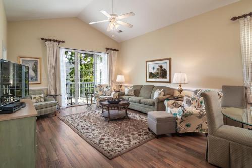 a living room with a couch and a table at Avian Forest Four Bedroom, Three Bath, Golf Villa in Pawleys Island