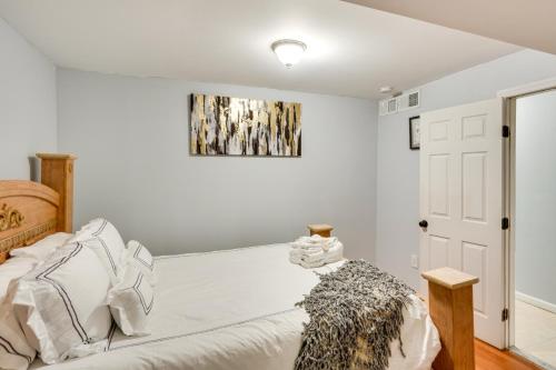 a bedroom with a bed and a painting on the wall at Cozy Albany Vacation Rental about 5 Mi to Downtown! in Albany