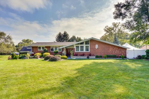 a brick house with a large yard at Cozy Albany Vacation Rental about 5 Mi to Downtown! in Albany