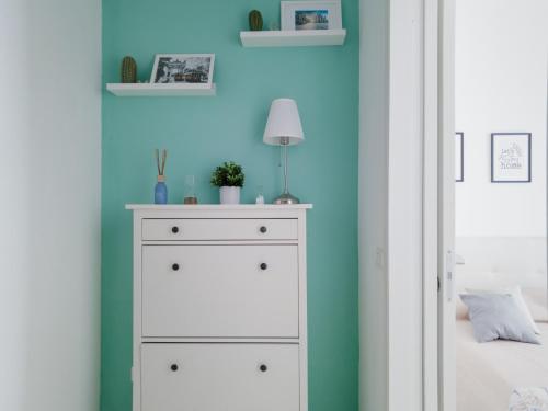 Cama o camas de una habitación en Nicole’s Appartament-a 15 min dal Duomo