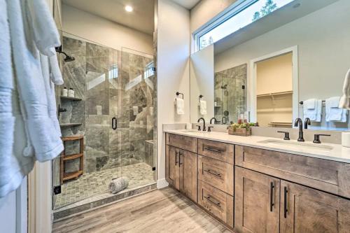 a bathroom with two sinks and a shower at Modern w Best Mtn Views, HotTub, Pool table in Durango