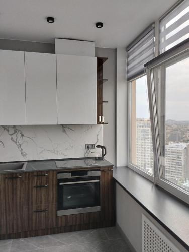 Una cocina o zona de cocina en Board apart hotel
