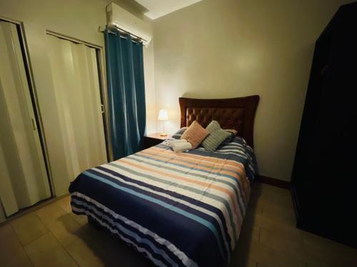 Un ou plusieurs lits dans un hébergement de l'établissement Tavalero Rooms