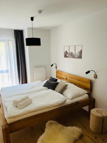 Postel nebo postele na pokoji v ubytování Stylový apartmán Ski&Bike, Janské Lázně