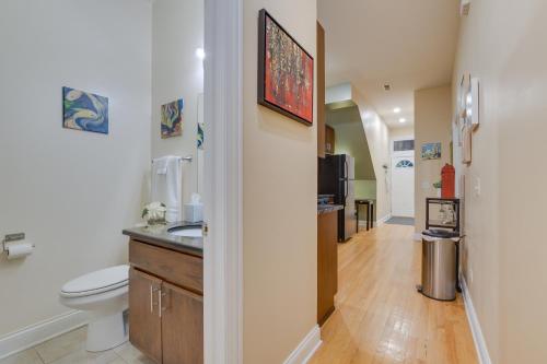 a bathroom with a toilet and a sink at Pet-Friendly Chicago Getaway 4 Mi to Downtown! in Chicago