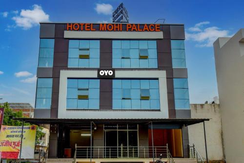 um palácio principal do hotel com uma placa em OYO Flagship Hotel Mohi Palace em Jaipur
