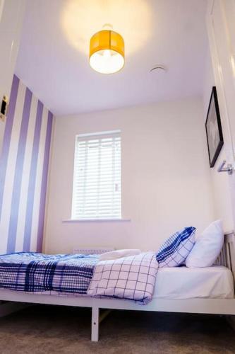 Ένα ή περισσότερα κρεβάτια σε δωμάτιο στο Caasi Homes