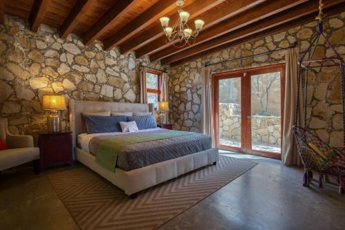 Postel nebo postele na pokoji v ubytování Maglen Resort