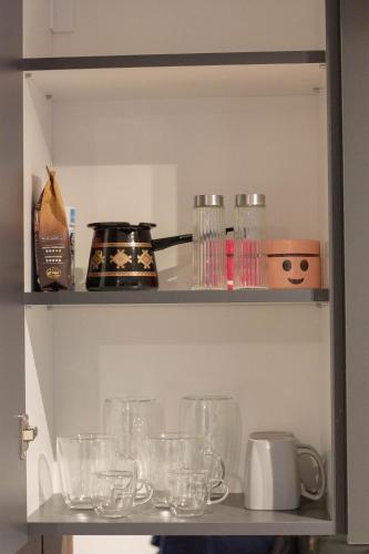 Kristall Apartments Premiumにあるキッチンまたは簡易キッチン