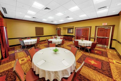 a conference room with tables and chairs in it at Hampton Inn & Suites Chadds Ford in Glen Mills