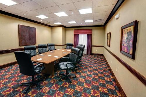 a conference room with a wooden table and chairs at Hampton Inn & Suites Chadds Ford in Glen Mills