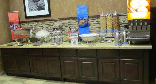 a kitchen counter with a bunch of appliances on it at Hampton Inn and Suites Hope in Hope