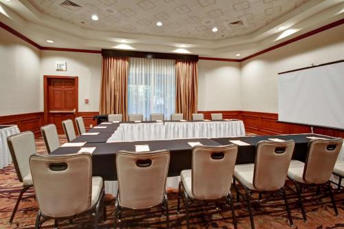 a large meeting room with a large table and chairs at DoubleTree by Hilton Hotel Flagstaff in Flagstaff