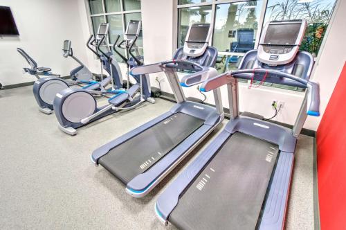 a row of cardio machines in a gym at Hilton Garden Inn Santa Barbara/Goleta in Santa Barbara