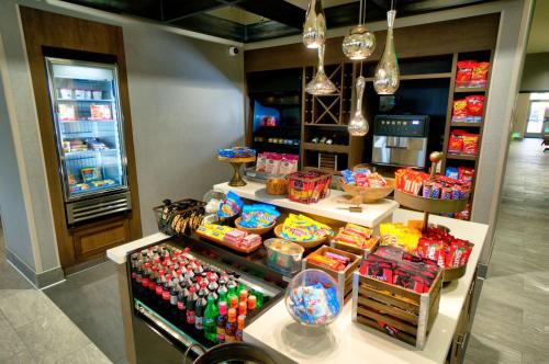 a store filled with lots of different types of candy at Hilton Garden Inn Santa Barbara/Goleta in Santa Barbara