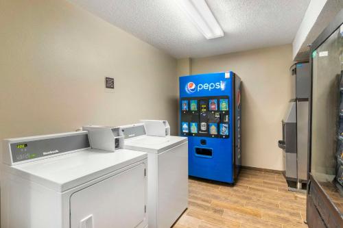 a gas station with a soda machine in a room at Sleep Inn Mt Pleasant - Charleston in Charleston