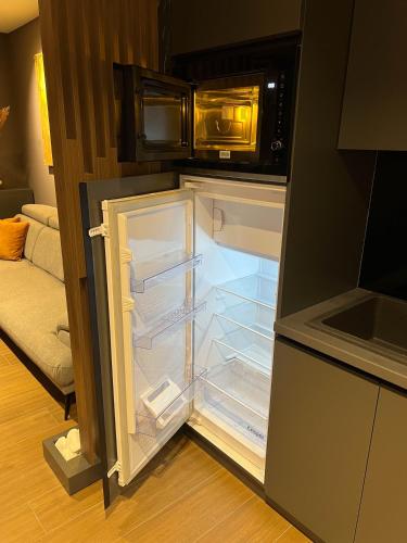 Kristall Apartments Premiumにあるキッチンまたは簡易キッチン