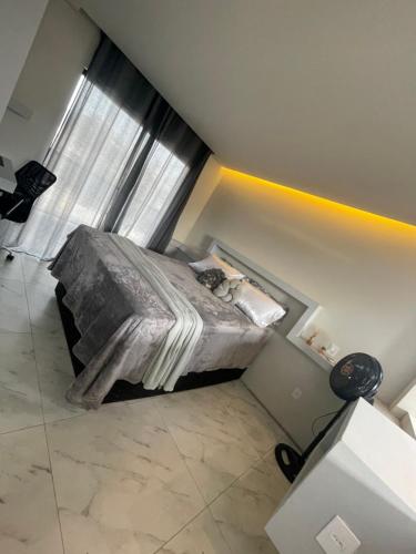 Postel nebo postele na pokoji v ubytování Loft proximo a diversas praias
