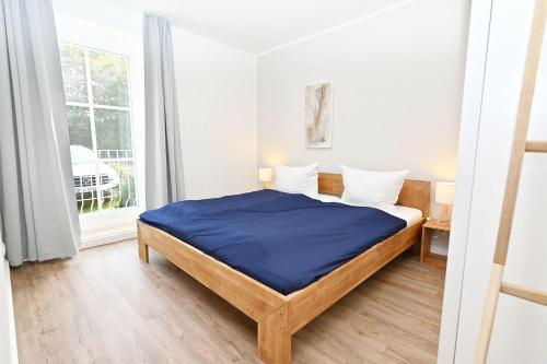 Postel nebo postele na pokoji v ubytování Meer-Natur