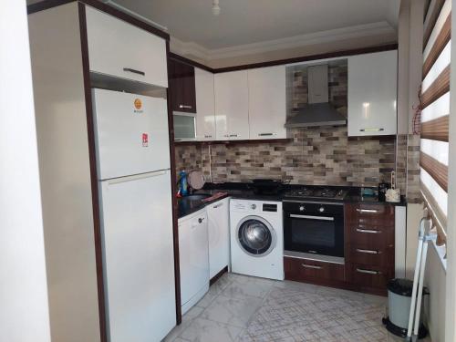 Η κουζίνα ή μικρή κουζίνα στο Be My Guest