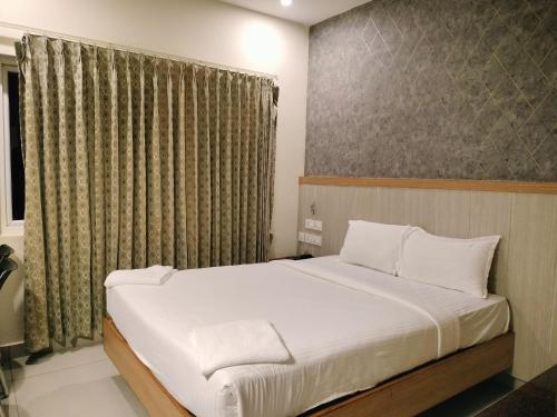 Wyt Hotels - Rameswaramにあるベッド