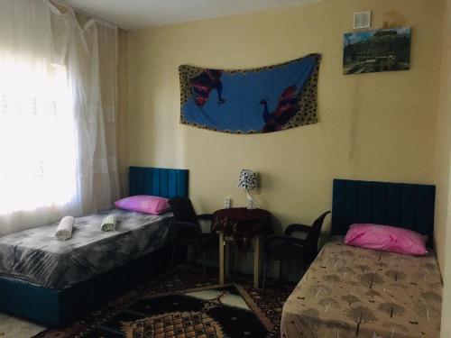 Postel nebo postele na pokoji v ubytování Rosa Hostel