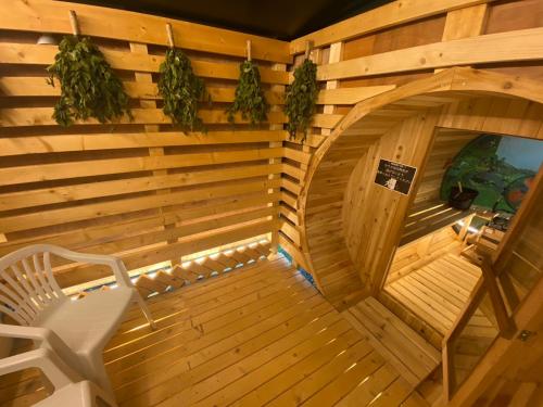 an inside view of a sauna with a bench at The Toya in Lake Toya