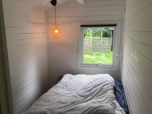 Katil atau katil-katil dalam bilik di Holiday home Gedsted III