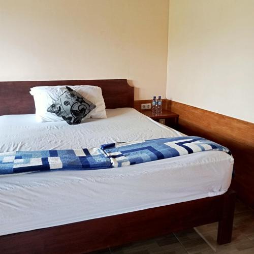 Кровать или кровати в номере Pesona Java Ijen Homestay