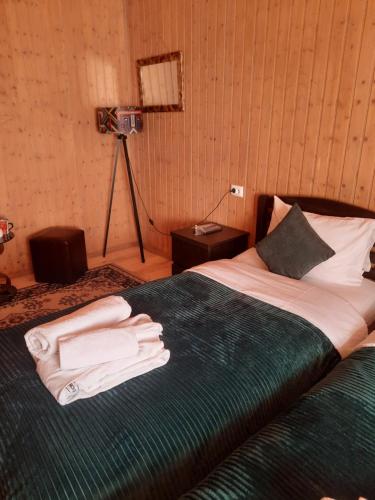 Cama o camas de una habitación en Bana