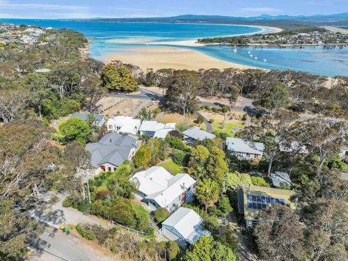 an aerial view of the house and the beach at Blue on Collins in Merimbula