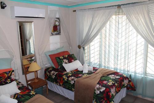 Ένα ή περισσότερα κρεβάτια σε δωμάτιο στο Ann's Lodge & Camping
