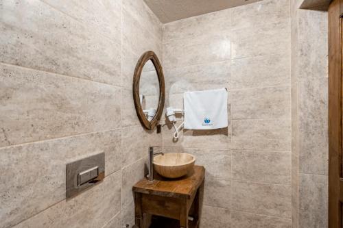 a bathroom with a sink and a mirror at Castle Panorama House in Nevsehir