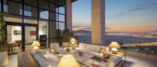 a lobby of a building with a view of the city at Hyatt Regency Izmir IstinyePark in İzmir