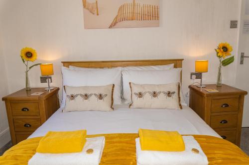 Ένα ή περισσότερα κρεβάτια σε δωμάτιο στο Seacrest Guest House