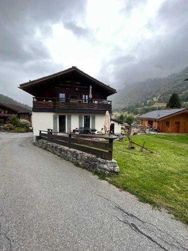 a small house on the side of a road at Nid de Moineau (Sparrow's Nest) in Versegeres 