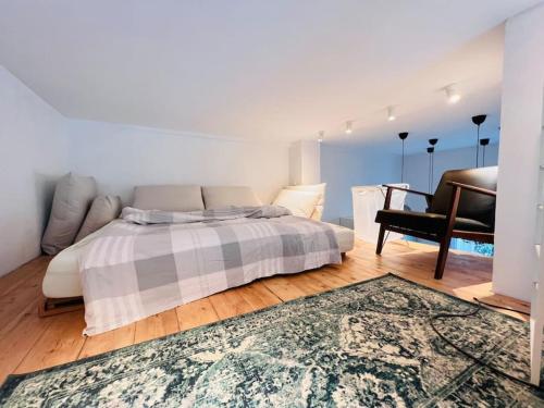 Postel nebo postele na pokoji v ubytování Luxus Loft im Herzen von Bochum Werne.