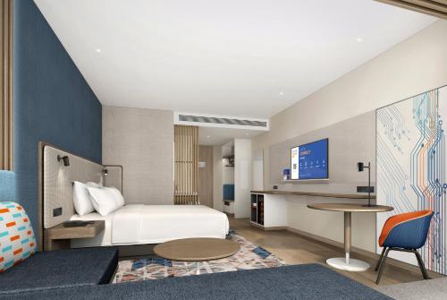 Postel nebo postele na pokoji v ubytování Holiday Inn Express Shenzhen Guangming Cloud Park by IHG