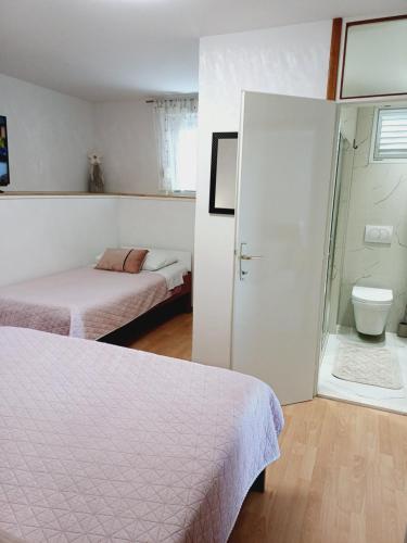 Kúpeľňa v ubytovaní Apartments Jure Miljak