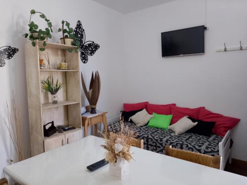 a living room with a couch and a table at Nono Angelo 3° in San Pedro