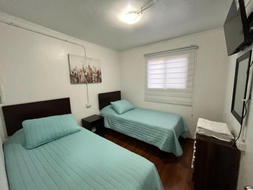 Katil atau katil-katil dalam bilik di Hospedaje Nuevo Amanecer
