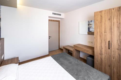 Katil atau katil-katil dalam bilik di Golden World Suite Hotel