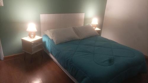 Un pat sau paturi într-o cameră la Hotel La Torre Rio Branco